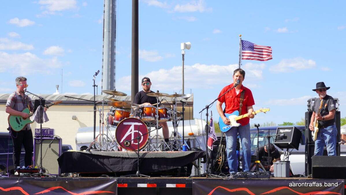 The Aaron Traffas Band playing live music in Kansas in downtown Pratt in 2023